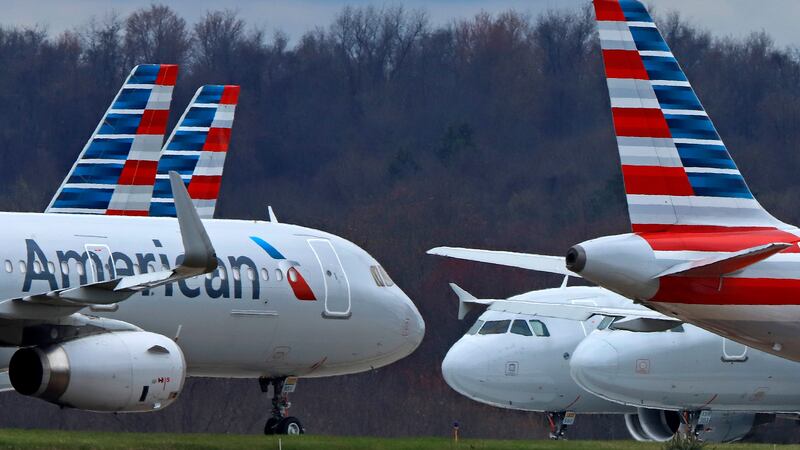 FILE - American Airlines planes are parked at Pittsburgh International Airport on March 31,...