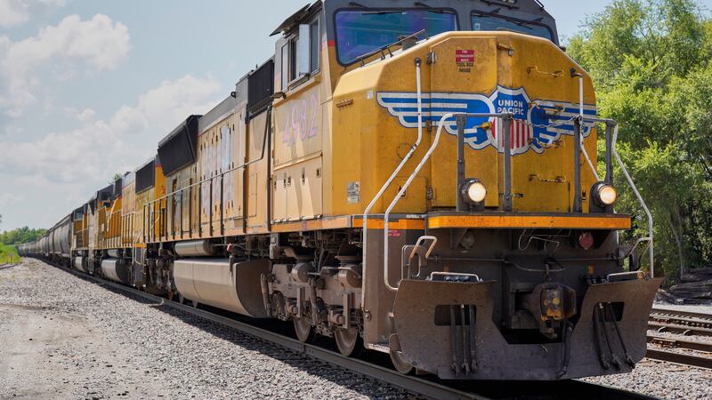 FILE - In this July 31, 2018, file photo a Union Pacific train travels through Union, Neb....