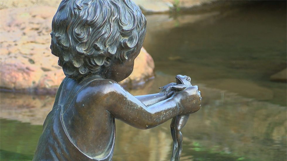 Sculptures and pavers featuring the names of more than 500 children serve as memorials...