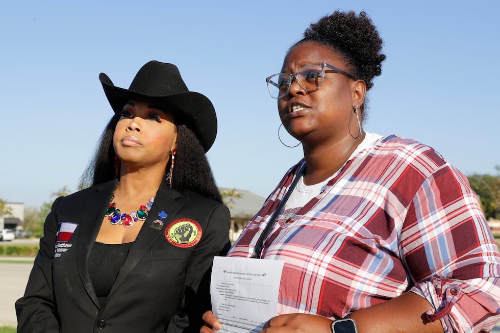 Advocate Dr. Candice Matthews, left, National Minister of Politics for The New Black Panther...