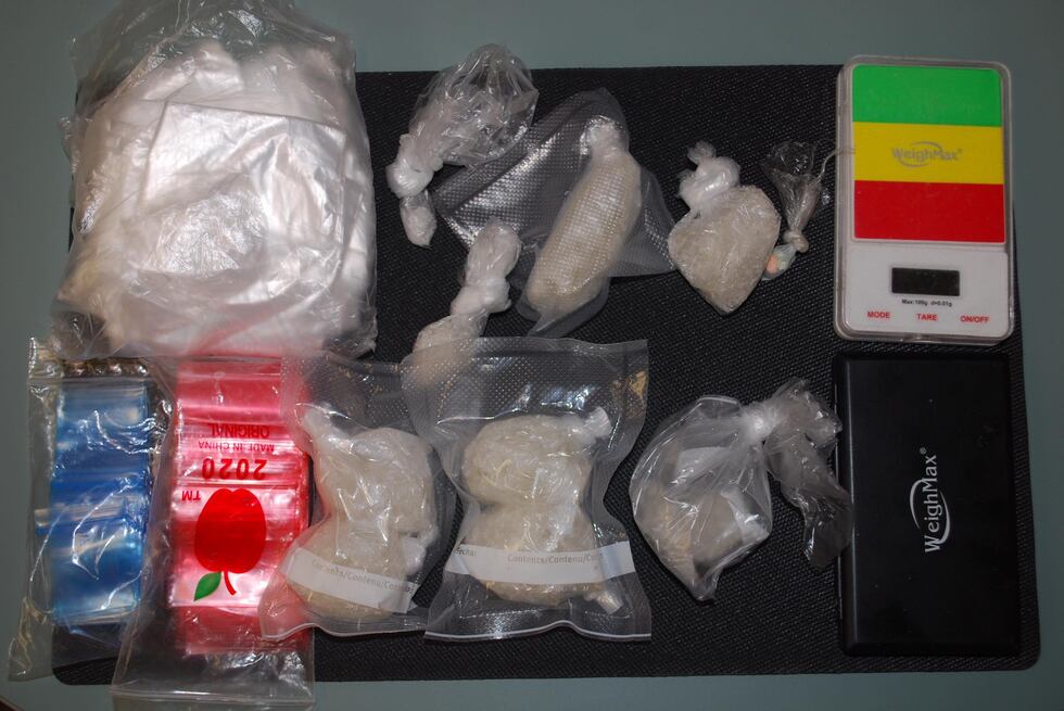 A search warrant turned up a large quantity of suspected methamphetamine and ecstasy in Titus...