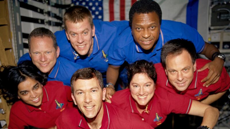This undated photo released in June 2003 provided by NASA shows STS-107 crew members aboard...