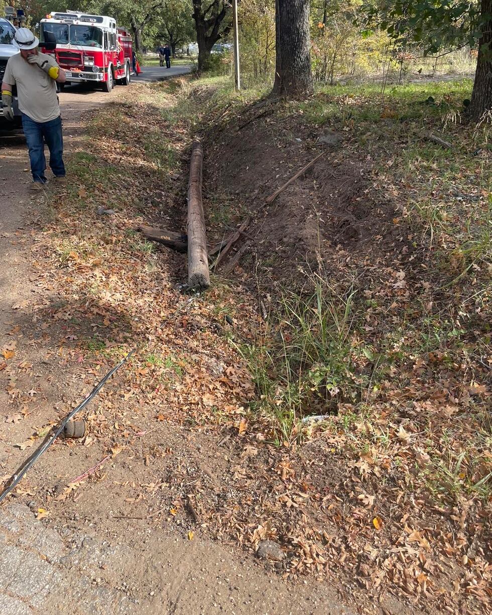 The crash knocked over a utility pole.