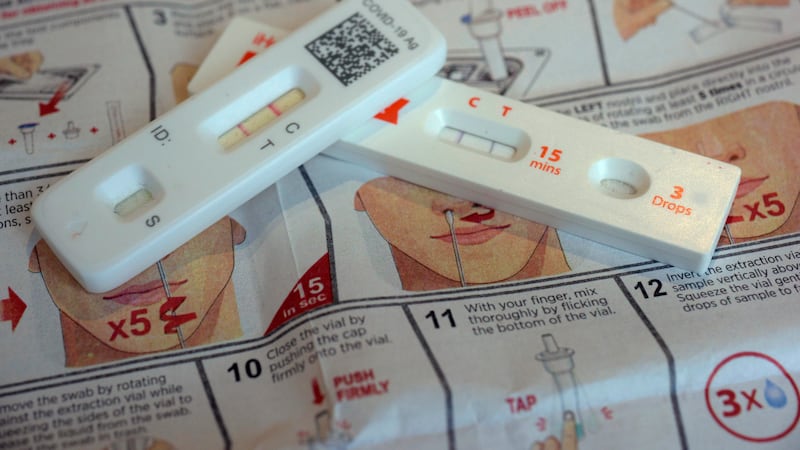 COVID-19 antigen home tests indicating a positive result are photographed in New York on...