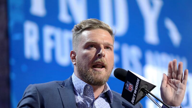 FILE - Former Indianapolis Colts player Pat McAfee announces the Colts' third round pick at...