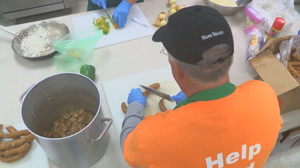 Volunteers from the Cathedral of the Immaculate Conception and from the community work in the...