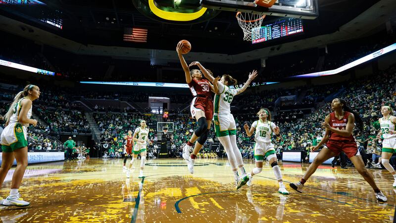 FILE - Stanford guard Haley Jones (30) shoots against Oregon forward Sedona Prince (32) in the...