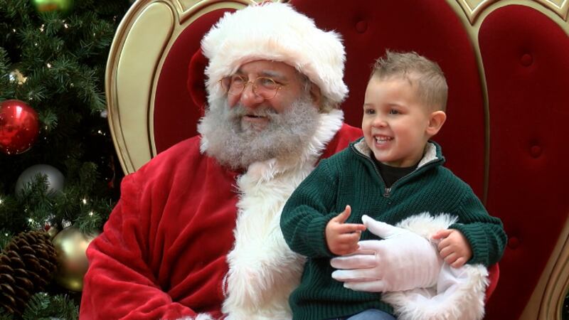 Three-year-old Elijah Brown was so excited to visit with Santa that he didn’t waste any time...