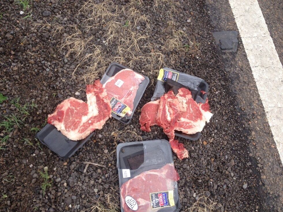 Packages of steaks thrown from car window during chase. (Source: KLTV staff)