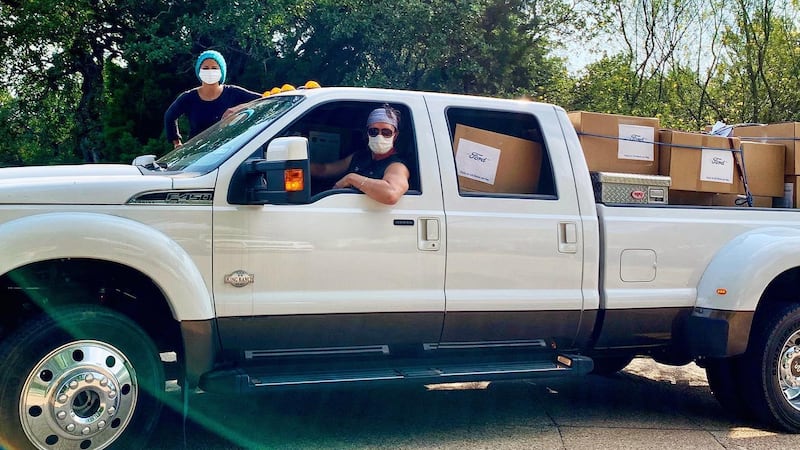 Matthew McConaughey, wife pose with boxes of PPE for rural hospitals