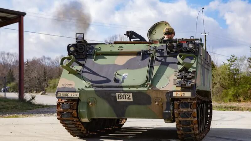 A U.S. Army soldier assigned to the Connecticut Army National Guard operates an M113 armored...