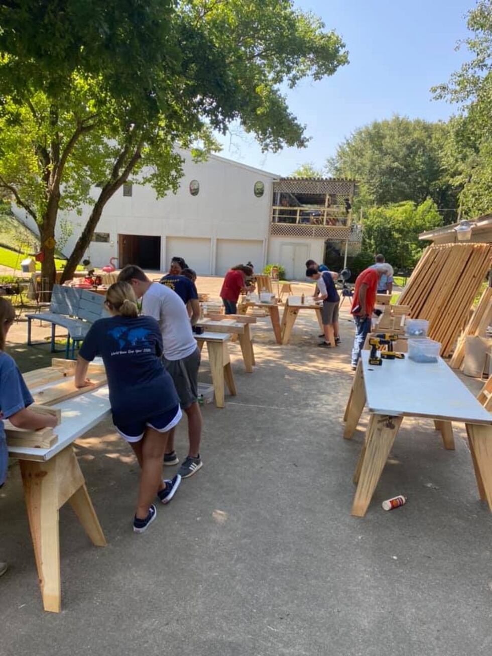 Volunteers work on dozens of beds during small August 2020 bed building event.