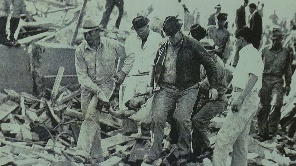 Crews work to pull people out of the rubble of the explosion at New London's school.