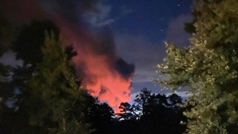 Firefighters still battling massive blaze that is visible from miles away