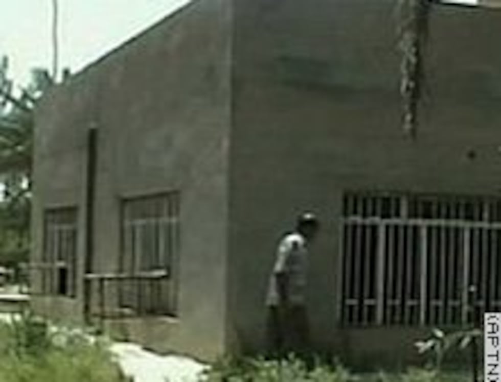 The murder of a 14-year-old girl and her family allegedly took place at this house in...